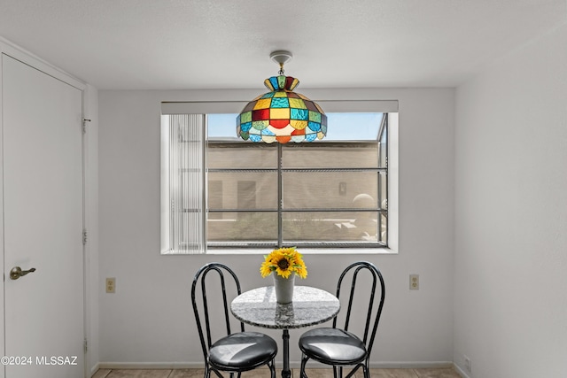 dining space with a healthy amount of sunlight