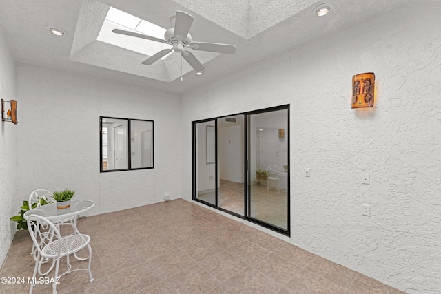 view of patio featuring ceiling fan