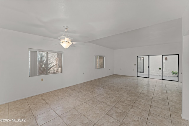 tiled empty room with ceiling fan