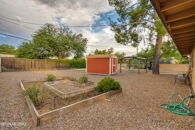 view of yard with a shed and a gazebo