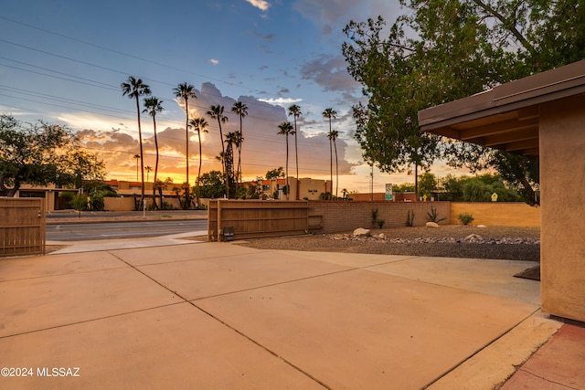 view of patio terrace at dusk