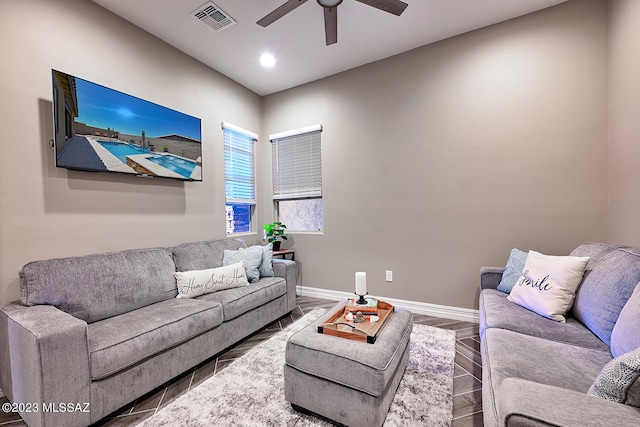 living room with visible vents, baseboards, recessed lighting, wood finished floors, and a ceiling fan