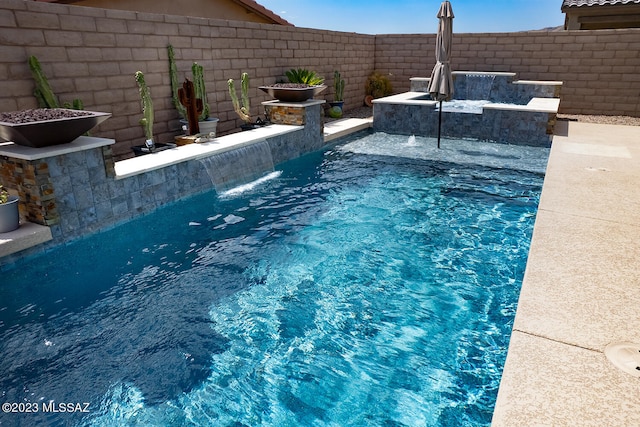 view of pool featuring a fenced backyard and a fenced in pool