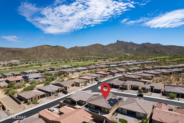 drone / aerial view with a mountain view and a residential view