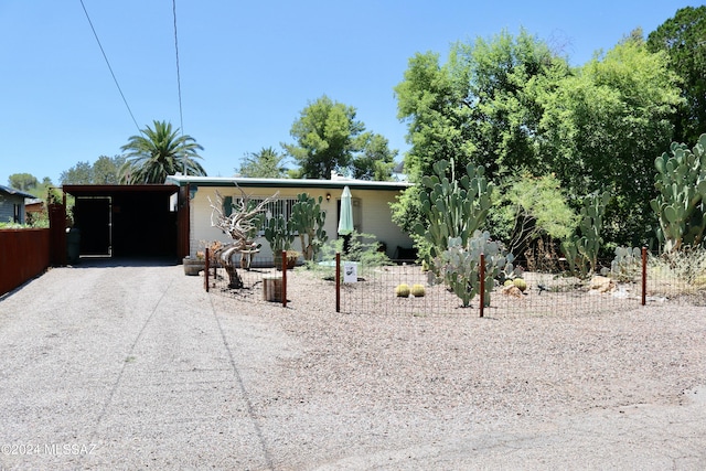 view of front of house with a carport