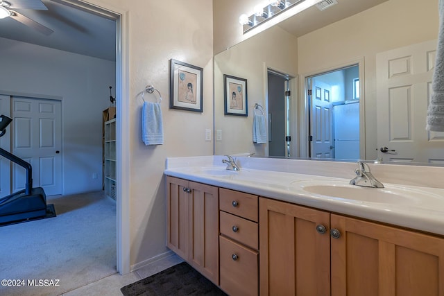 bathroom featuring vanity and ceiling fan