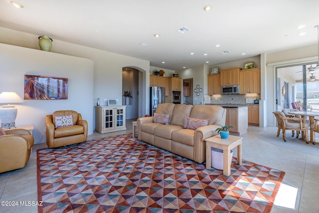 living room featuring light tile patterned flooring