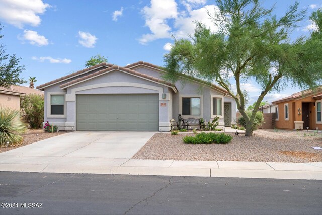 single story home with a garage