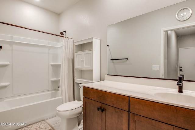 full bathroom featuring tile patterned floors, vanity, shower / bath combo with shower curtain, and toilet