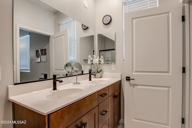 bathroom with dual bowl vanity