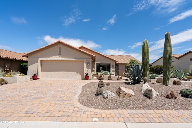 view of front of property featuring a garage