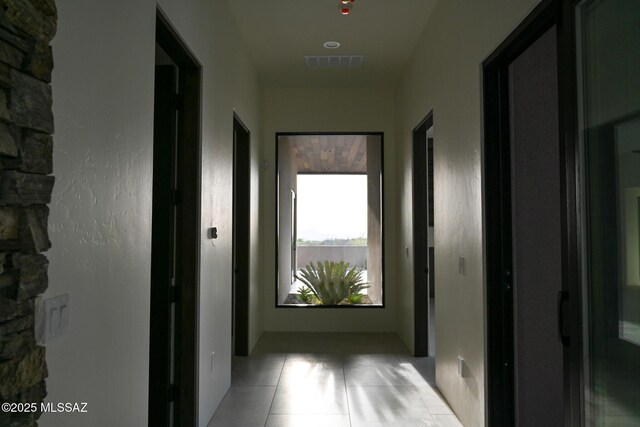 2155 E Desert Garden Dr, Tucson, AZ 85718 - hallway featuring visible vents and light tile patterned floors