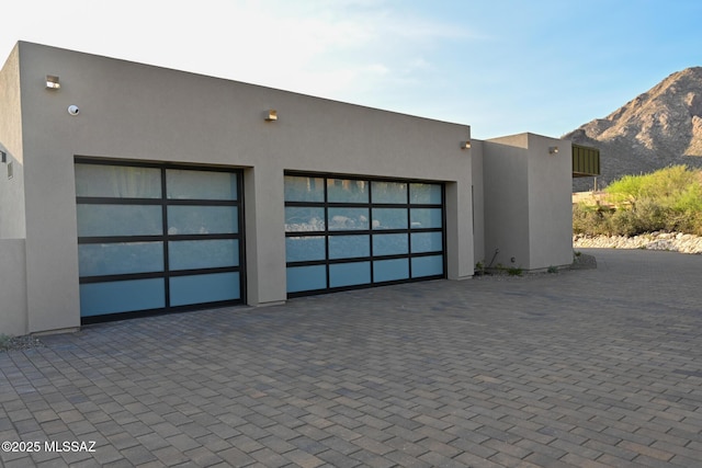 2155 E Desert Garden Dr, Tucson, AZ 85718 - garage with a mountain view and decorative driveway