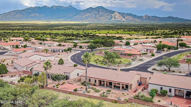 drone / aerial view with a residential view and a mountain view