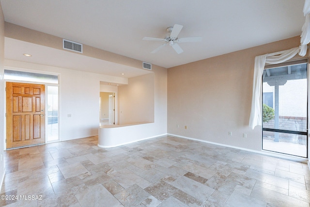 empty room featuring ceiling fan