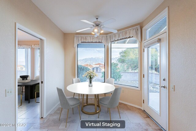 dining area featuring ceiling fan