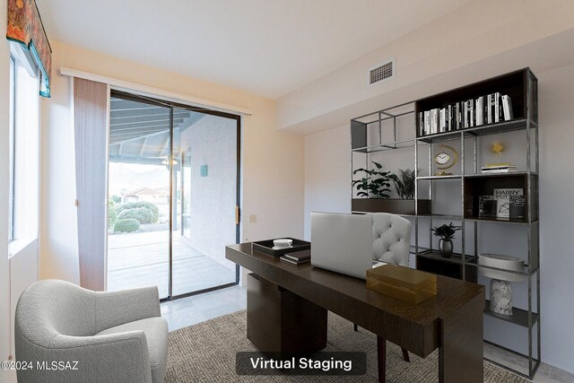 office area with tile patterned flooring