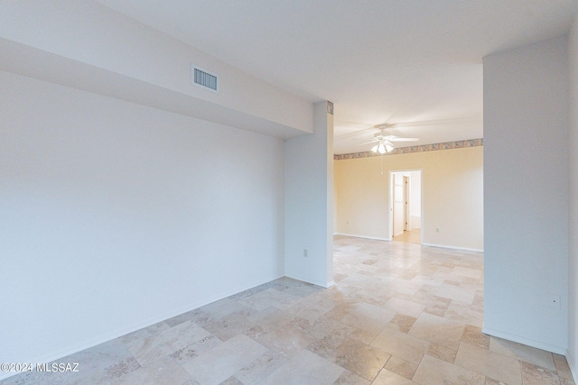 empty room with ceiling fan