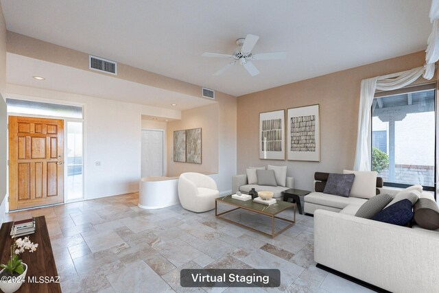 living room with ceiling fan