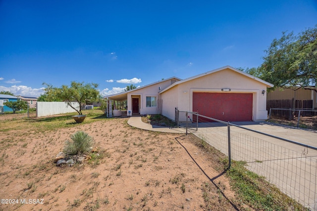 ranch-style home with a garage