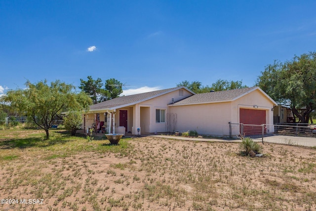 ranch-style home with a garage