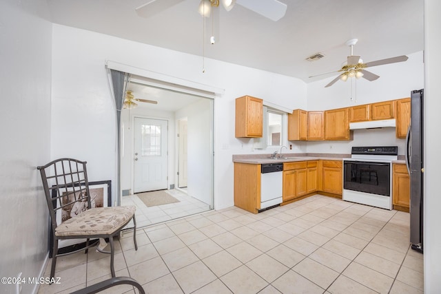 kitchen with ceiling fan, lofted ceiling, sink, and white appliances