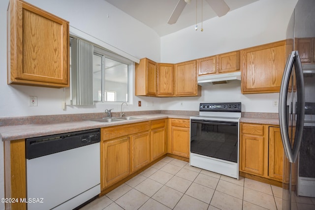 kitchen featuring sink, white appliances, light tile patterned floors, and ceiling fan