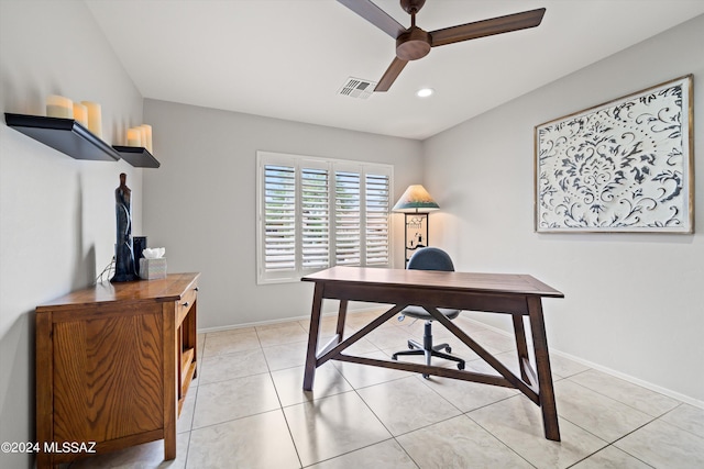 tiled office space with ceiling fan