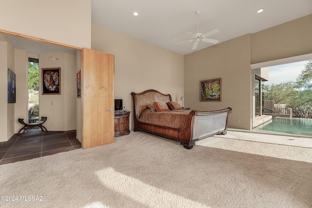 bedroom with multiple windows, access to exterior, and dark colored carpet