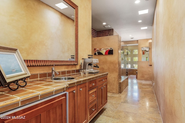 kitchen with sink and tile countertops