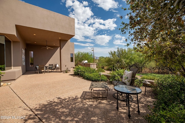 view of patio with ceiling fan