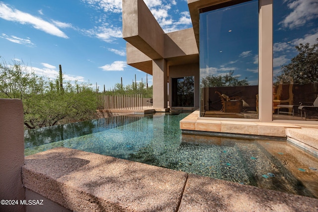 view of pool with a patio