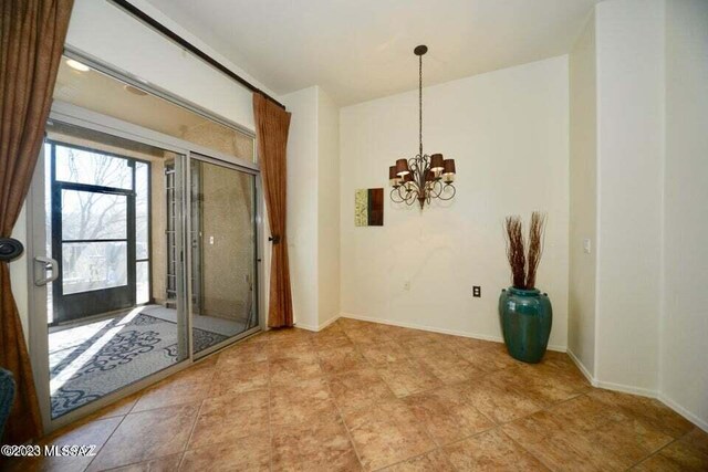 tiled living room with ceiling fan