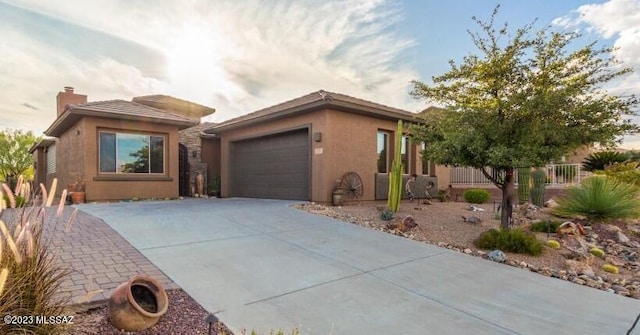 view of front of home with a garage