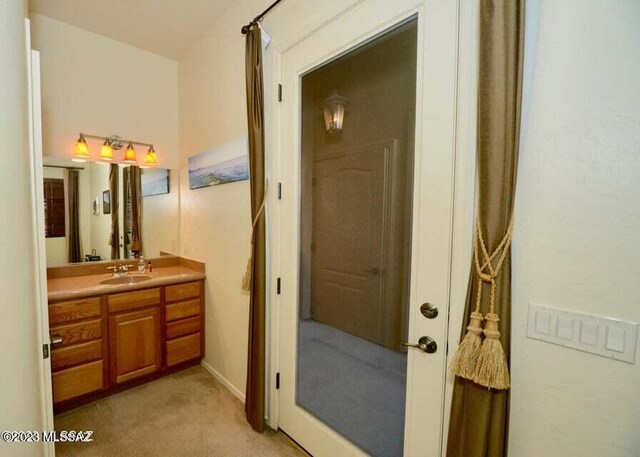 bathroom with tile patterned floors, a shower with door, and toilet