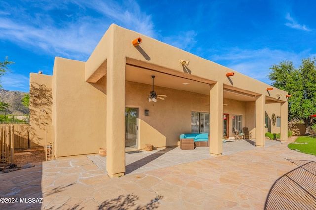 rear view of house with a patio