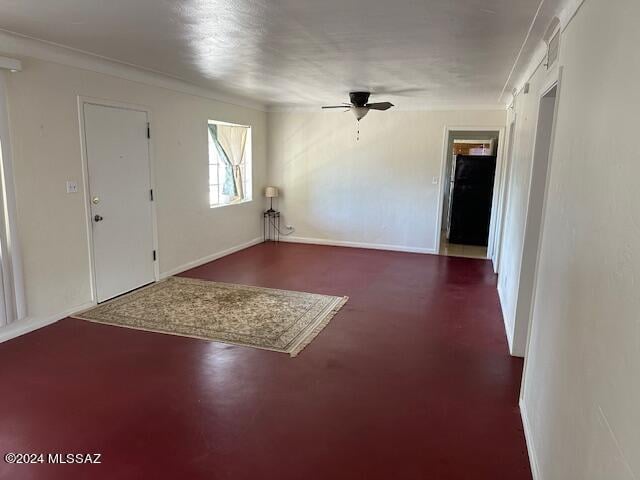 foyer entrance with ceiling fan