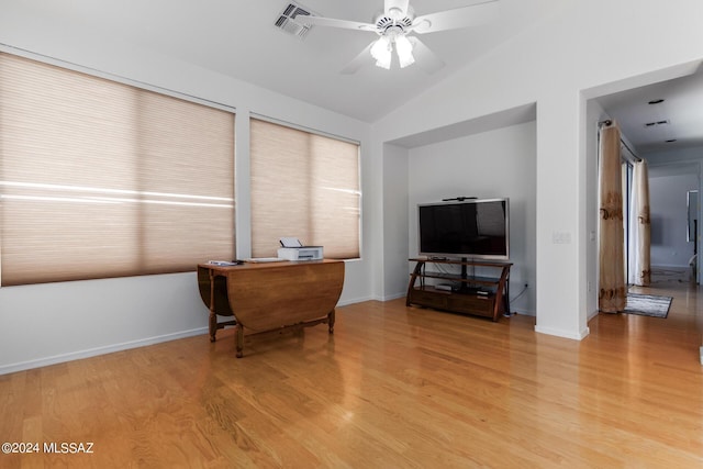 sitting room with lofted ceiling, light hardwood / wood-style flooring, and ceiling fan