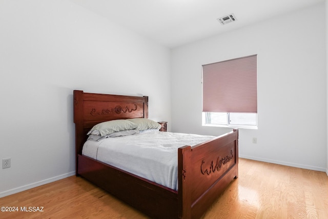 bedroom featuring light hardwood / wood-style floors