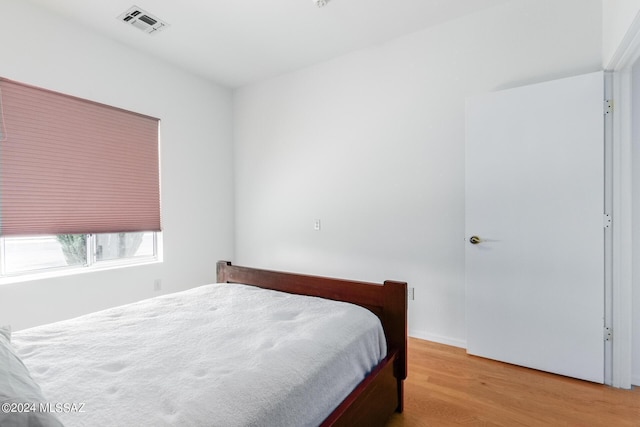 bedroom featuring light hardwood / wood-style flooring