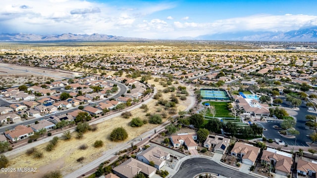 birds eye view of property featuring a mountain view