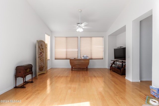 miscellaneous room featuring lofted ceiling, ceiling fan, and light wood-type flooring