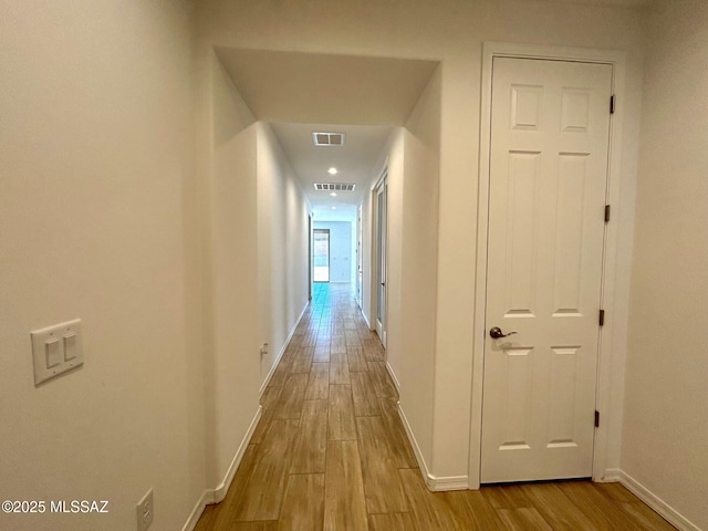 hall featuring light hardwood / wood-style floors