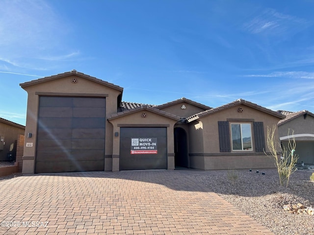 view of front of home featuring a garage