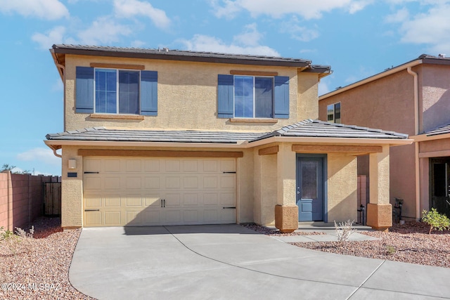 front of property with a garage