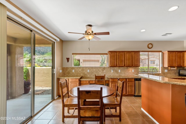 dining room featuring light tile patterned flooring, visible vents, a ceiling fan, and recessed lighting