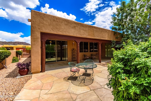 view of patio / terrace with fence