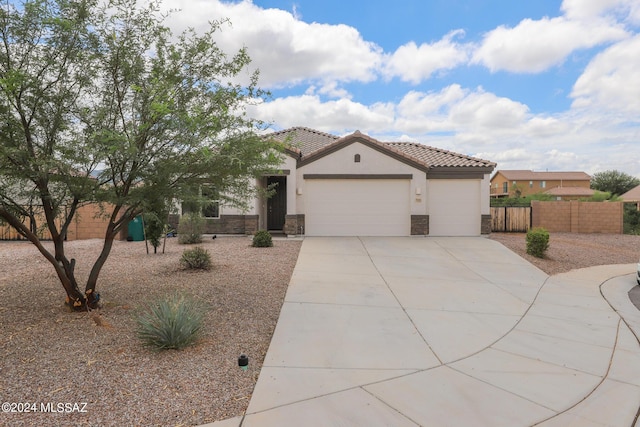 view of front of property with a garage