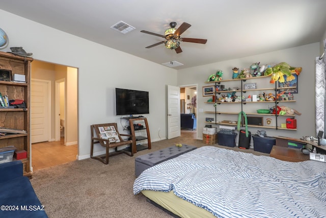 bedroom with ceiling fan and carpet