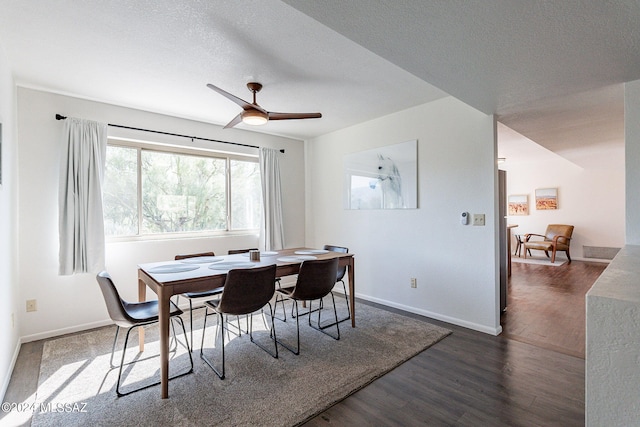 living room with dark hardwood / wood-style floors and ceiling fan